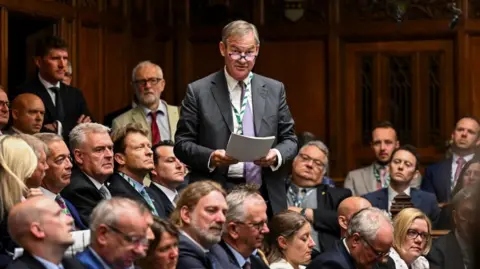 Reuters Rupert Lowe asking a question at Prime Minister's Questions