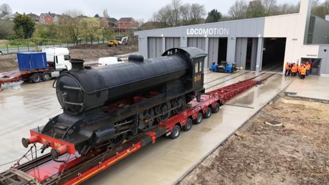 The Q7 locomotive as it is moved into Locomotion's £8m New Hall in in Shildon