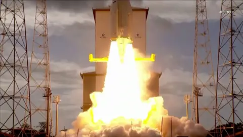 Column of fire after rocket sets off from launch pad