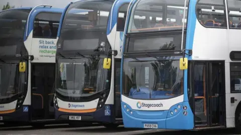 Getty Images Line of buses