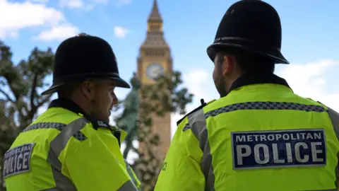 Police men outside parliament in London