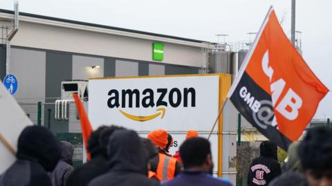 Amazon staff members on a GMB union picket line outside the retailer's site in Coventry