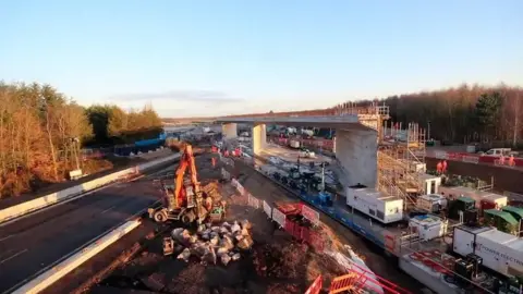 Bridge being dragged into position