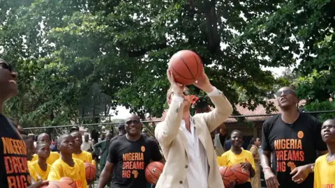 Prince Harry playing basketball
