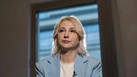 Reuters Yekaterina Duntsova sits in an interview in Moscow on 25 December 2023