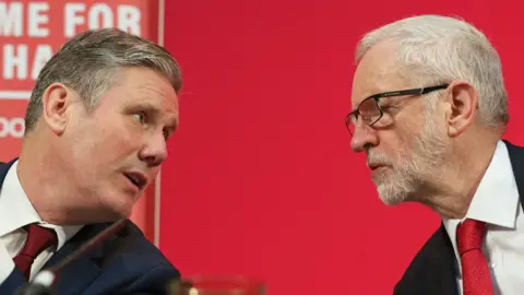 PA Media Sir Keir Starmer and Jeremy Corbyn in 2019