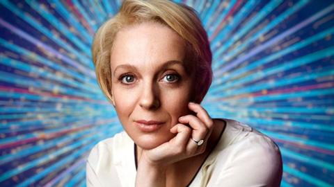 Amanda Abbington's Strictly launch promotional photo, showing a portrait of her in front of a Strictly background