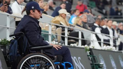 Lucas Feron watches on in his position as a line judge at the 2024 French Open