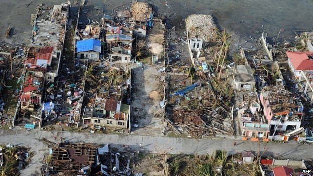 Destroyed houses hit by Typhoon Haiyan in the town of Guiuan in Eastern Samar province, central Philippines on 11 November 2013