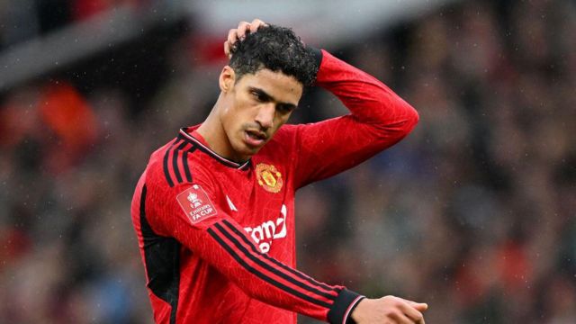Raphael Varane of Manchester United reacts during the Emirates FA Cup Quarter Final between Manchester United and Liverpool FC at Old Trafford