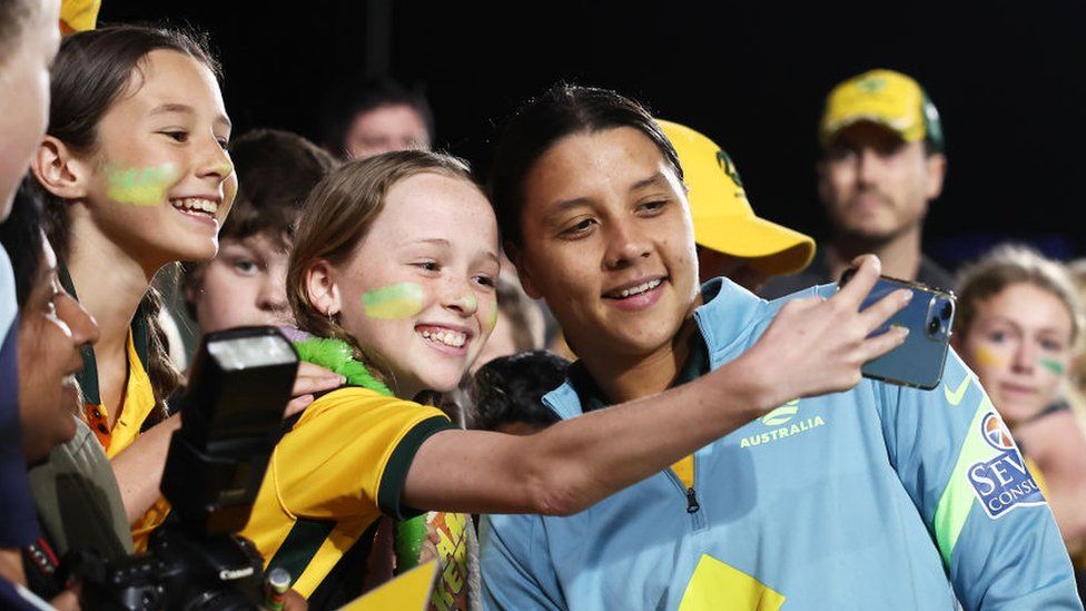Sam Kerr takes a selfie with fans