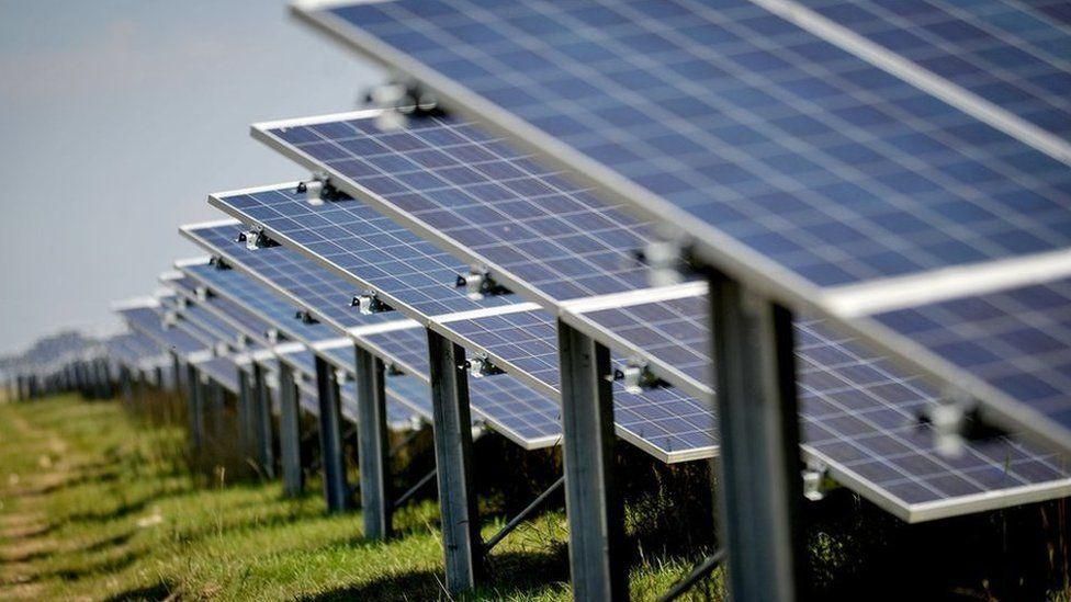 Generic image of solar panels in a field