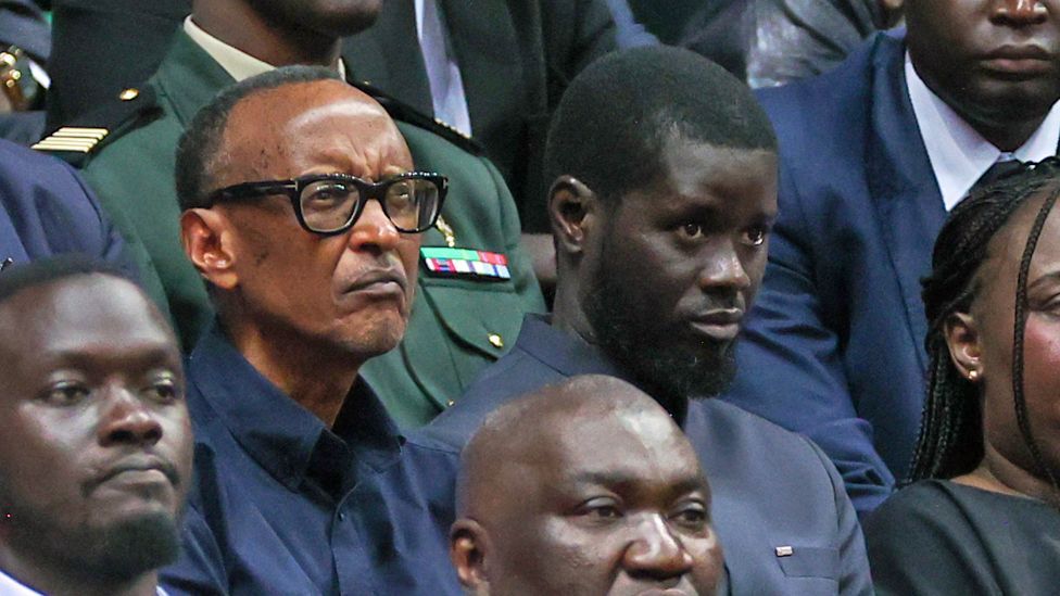 The presidents of Rwanda, Paul Kagame (L), and Senegal, Bassirou Diomaye Faye (R), watch a basket ball match in Dakar, Senegal - Sunday 12 May 2024