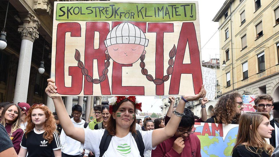 School students and activists take part in the Global Strike for Climate rally in Turin, Italy, 27 September 2019