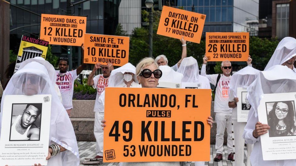 A protest group called Gays Against Guns performs in honour of victims of gun violence in New York City