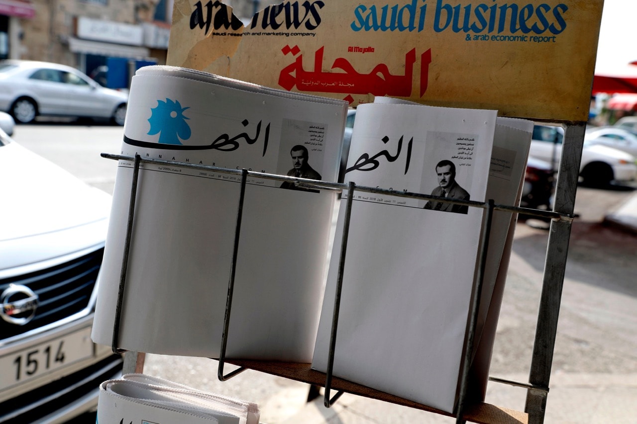 Blank copies of Lebanon's leading newspaper "An-Nahar" are displayed on a newspaper stand outside a bookstore in the port city of Byblos, north of Beirut, 11 October 2018; the paper went blank to protest a political deadlock and economic woes in the country, JOSEPH EID/AFP/Getty Images