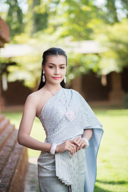 https://image.freepik.com/free-photo/beautiful-woman-wearing-typical-thai-dress_1150-5482.jpg