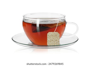 Brewing aromatic tea. Cup with teabag isolated on white