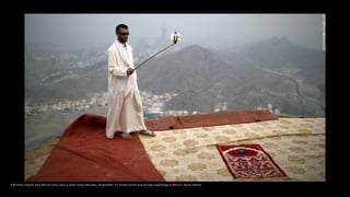 A Muslim pilgrim atop Mount Thor uses a selfie stick Saturday, September 19, ahead of the annual Hajj pilgrimage in Mecca, Saudi Arabia.
 