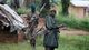 Suspected militants kill at least 10 in attack on eastern Congo village