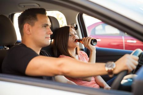 Is it legal for passengers to drink alcohol inside a car?