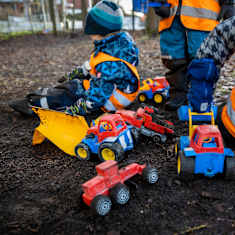 Children playing in a daycare yard.