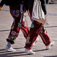 Students wearing overalls.