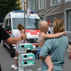 Photo shows children being evacuated from the Ohmatdyt Children's Hospital in Kyiv following a Russian missile strike on Monday.