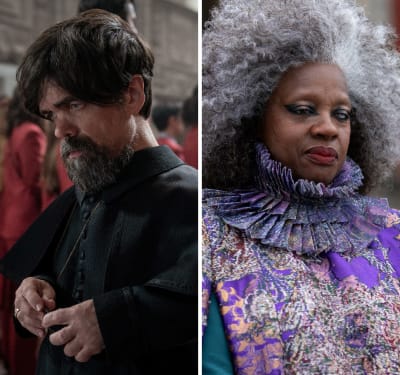 Närbild på dekanen Highbottom (Peter Dinklage) och Dr. Volumnia Gaul (Viola Davis), de ser båda allvarliga ut.