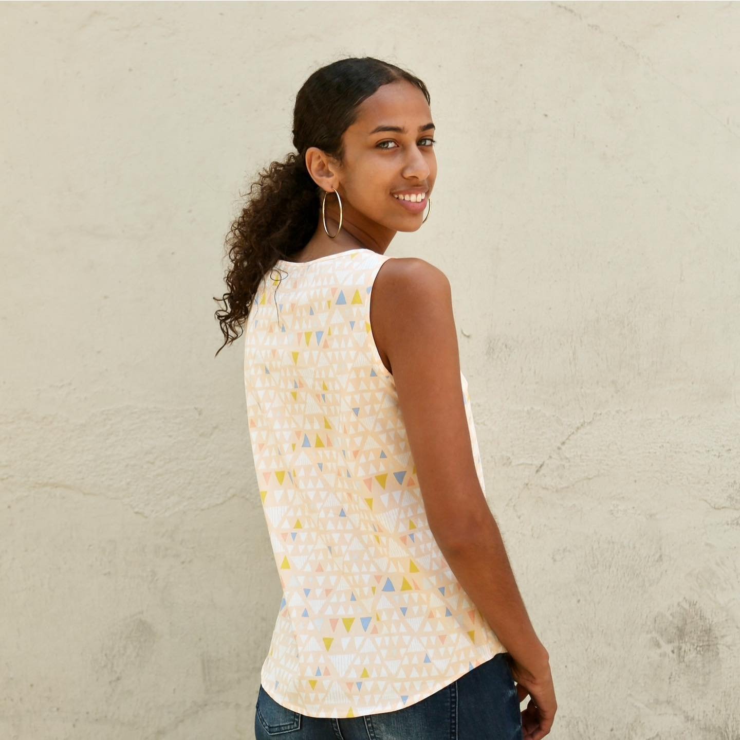 Let&rsquo;s take a look back at the two Gemma tank samples I sewed to show the two neckline options back when I first launched the Gemma pattern back in 2016. 
The jewel neckline is higher and shown in gold cotton lawn 💛 and the scoop neckline is lo