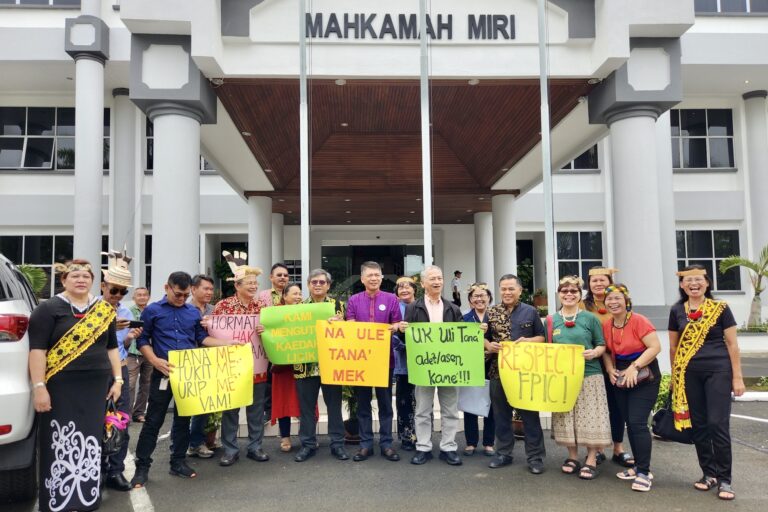 Community members celebrating the withdrawal of the lawsuit against SAVE Rivers.