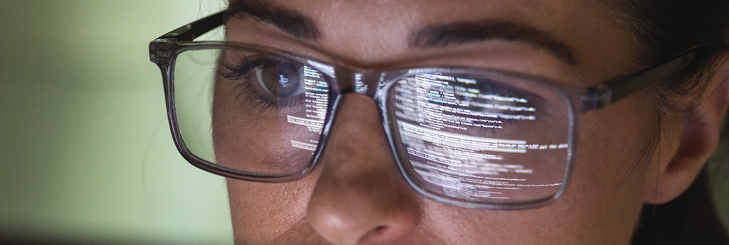 Woman staring at computer screen