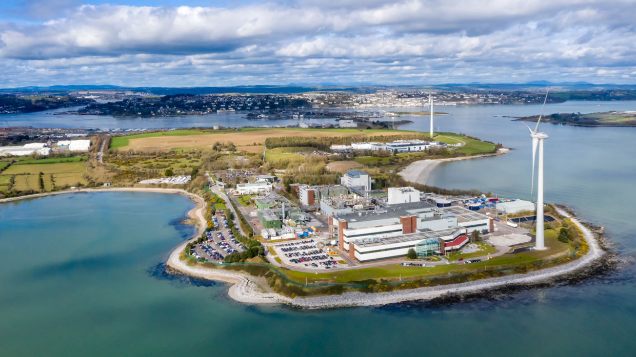 A sustainable power plant located on a peninsula surrounded by water 