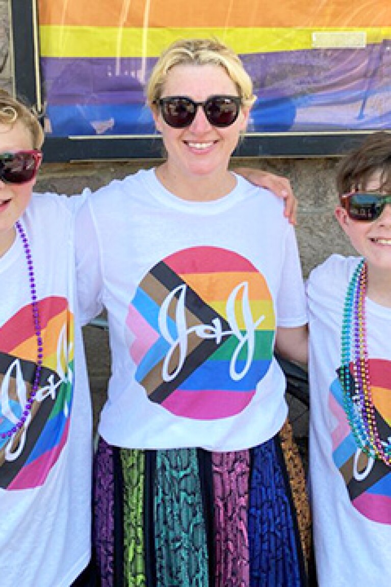 Jennifer Curley and her sons celebrating at a Pride event