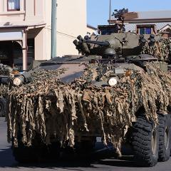 Australian soldiers in armoured vehicles