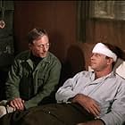 William Christopher and Alan Fudge in M*A*S*H (1972)