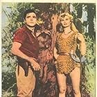 Christian Drake and Irish McCalla in Sheena: Queen of the Jungle (1955)