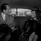 Bette Davis and John Abbott in Deception (1946)