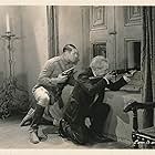 Victor McLaglen and John St. Polis in A Devil with Women (1930)