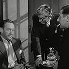George Sanders, Robert Coote, and Alan Napier in Lured (1947)