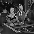 Irene Dunne and Robert Montgomery in Unfinished Business (1941)