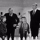 Donald Pleasence, Ray Milland, Kim Richards, and Ike Eisenmann in Escape to Witch Mountain (1975)