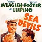 Preston Foster, Ida Lupino, and Victor McLaglen in Sea Devils (1937)