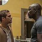 Mike Colter and Finn Jones in Luke Cage (2016)