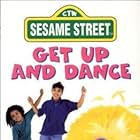 Desiree Casado, Caroll Spinney, and Big Bird in Sesame Street: Get Up and Dance (1997)