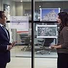 Carly Pope and Rick Hoffman in Suits (2011)