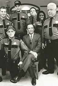 Ben Bode, JD Cullum, Ryan Hurst, Jerry Kernion, Monte Markham, David Sage, and LaRita Shelby in Campus Cops (1995)