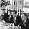 John Travolta, William H. Macy, Tony Shalhoub, and Zeljko Ivanek in A Civil Action (1998)