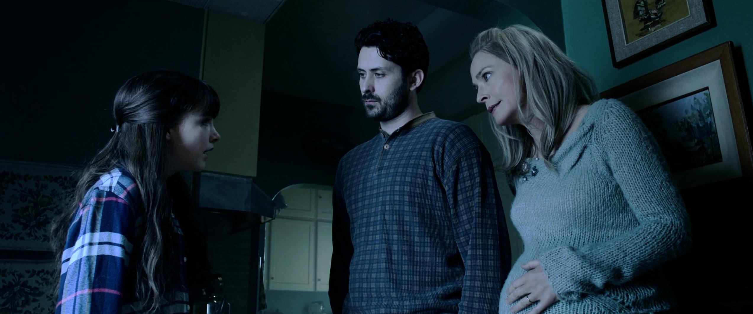 Susanna Thompson, Andy Bean, and Mckenna Grace in Malignant (2021)