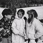 Johnny Galecki, Rebecca Harrell and Ariana Richards on the set of "Prancer".